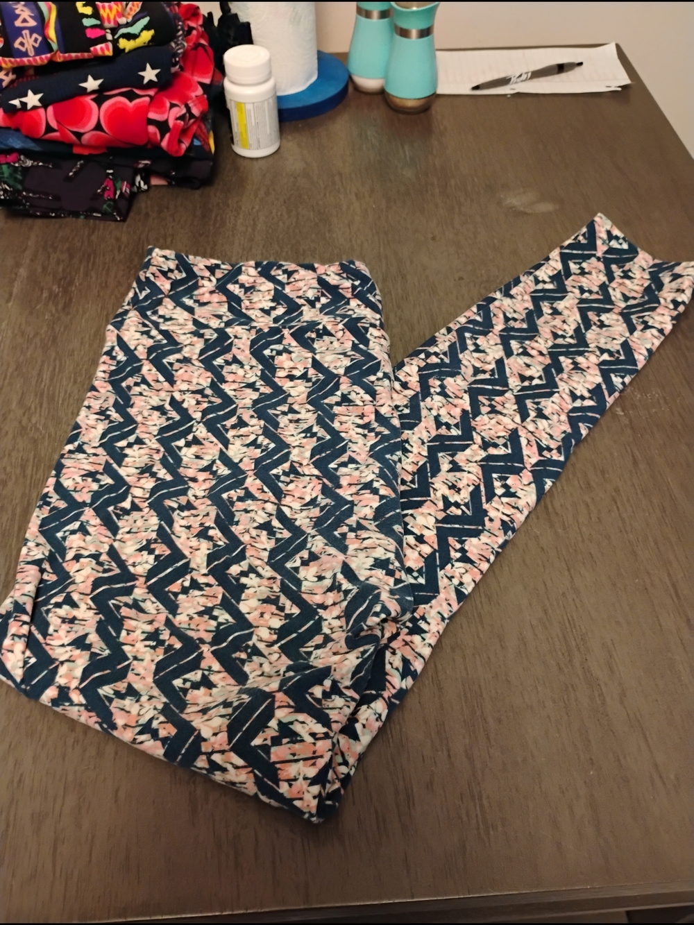 LuLaRoe navy and blush geometric floral leggings